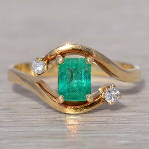 Emerald and Natural Diamond Bypass Ring in Yellow Gold
